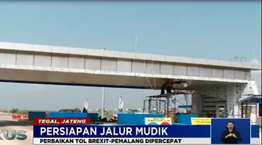 Para pekerja kini terus melakukan pekerjaan pembuatan rambu dan lampu-lampu penerangan.