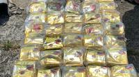 Polisi menggagalkan peredaran 50 kilogram sabu yang disembunyikan dalam kemasan teh. (Liputan6.com/Ady Anugrahadi).