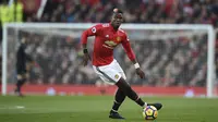 Gelandang Manchester United, Paul Pogba mencattkan namanya pada daftar pemberi assist terbanyak Premier League, Pogba total mengantongi lima assist hingga pekan ke-16. (AFP/Oli Scarff)