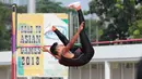 Seorang atlet Lompat Tinggi beraksi pada pada kejuaraan Nasional Atletik 2018 di Stadion Madya (8/5/2018). Kejurnas Atletik berlangsung dari tanggal 8-12 Mei 2018. (Bola.com/Nick Hanoatubun)