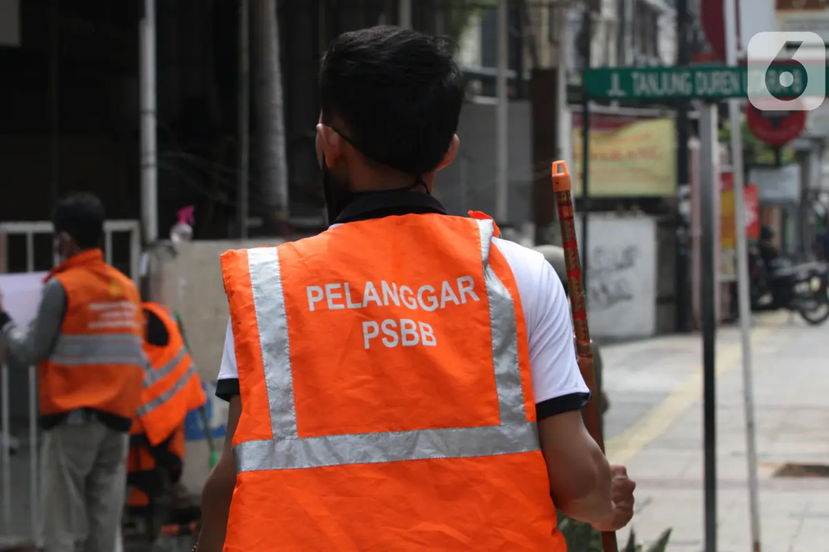 FOTO: Kasus COVID-19 Meningkat, Razia Masker di DKI Jakarta Kian Gencar