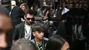 Pesepak bola Argentina, Lionel Messi mencuri perhatian saat Formula 1 GP Miami 2026 pada Minggu (03/05/2026). (AFP/Chandan Khanna)
