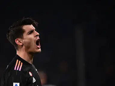 Penyerang Juventus Alvaro Morata berselebrasi setelah mencetak gol sundulan ke gawang Sampdoria pada pekan ke-29 Liga Italia di Stadion Luigi Ferraris di Stadion Luigi Ferraris, Minggu (13/3/2022) dini hari WIB. Dua gol Alvaro Morata membantu Juventus menekuk Sampdoria 3-1. (Marco BERTORELLO/AFP)