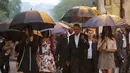 Presiden AS, Barack Obama dan keluarganya berwisata ke Old Havana pada kunjungan awal setibanya di Kuba, Minggu (20/3). Kunjungan ini yang pertama dilakukan presiden AS dalam 88 tahun, sekaligus pembuka babak baru hubungan dua negara. (REUTERS/stringer)