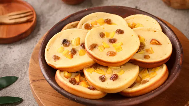 manan sahmin kue lumpur