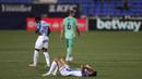 Reaksi pemain Leganes Oscar Leganes (depan) usai menghadapi Real Madrid pada pertandingan La Liga di Stadion Butarque, Leganes, Madrid, Spanyol, Minggu (19/7/2020). Pertandingan berakhir dengan skor 2-2. (AP Photo/Bernat Armangue)