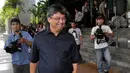 Dirut PT Assa Nusa Indonesia Paul Nelwan keluar dari gedung KPK usai menjalani pemeriksaan, Jakarta, (30/9/14). (Liputan6.com/Miftahul Hayat)