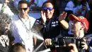 Jorge Lorenzo menyemprotkan sampanye setelah memastikan gelar juara dunia MotoGP 2015, Minggu (8/11/2015). (EPA/Kai Foersterling)