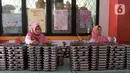 Program makan bergizi gratis perdana pada hari ini, Senin (6/1/2024) sekaligus untuk mematangkan ketepatan waktu distribusi serta kecukupan kandungan gizinya. (Liputan6.com/Herman Zakharia)