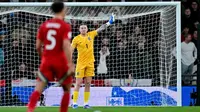 Kiper Timnas Inggris, Jordan Pickford, terlihat dalam pertandingan persahabatan antara Inggris dan Wales di Stadion Wembley, London, Jumat (10-10-2025) dini hari WIB. (Ben STANSALL/AFP)
