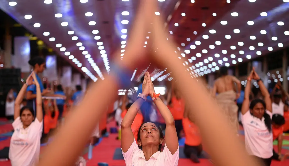 Saat ini, yoga dipraktikkan secara luas dalam berbagai bentuk di seluruh dunia dan terus berkembang. (Idrees MOHAMMED/AFP)