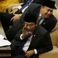 Abraham Lunggana atau Haji Lulung saat menghadiri pelantikan anggota DPR, MPR, dan DPD di Kompleks Parlemen, Jakarta, Selasa (1/10/2019). Haji Lulung berhasil melenggang mulus menjadi legislator DPR RI periode 2019-2024. (Liputan6.com/JohanTallo)