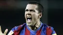 Kegembiraan bek Barcelona, Daniel Alves seusai gol Lionel Messi ke gawang Malaga dalam lanjutan La Liga di Camp Nou Stadium, 27 Februari 2010 AFP PHOTO / JOSEP LAGO 