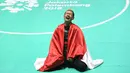 Ekspresi pesilat Indonesia, Hanifah Yudani Kusumah usai mengalahkan Thai Linh Nguyen asal Vietnam dalam babak final Kelas C Putra Asian Games 2018 di Padepokan Pencak Silat TMII, Jakarta, Rabu (29/8). (ANTARA FOTO/INASGOC/Melvinas Priananda/nak/18)