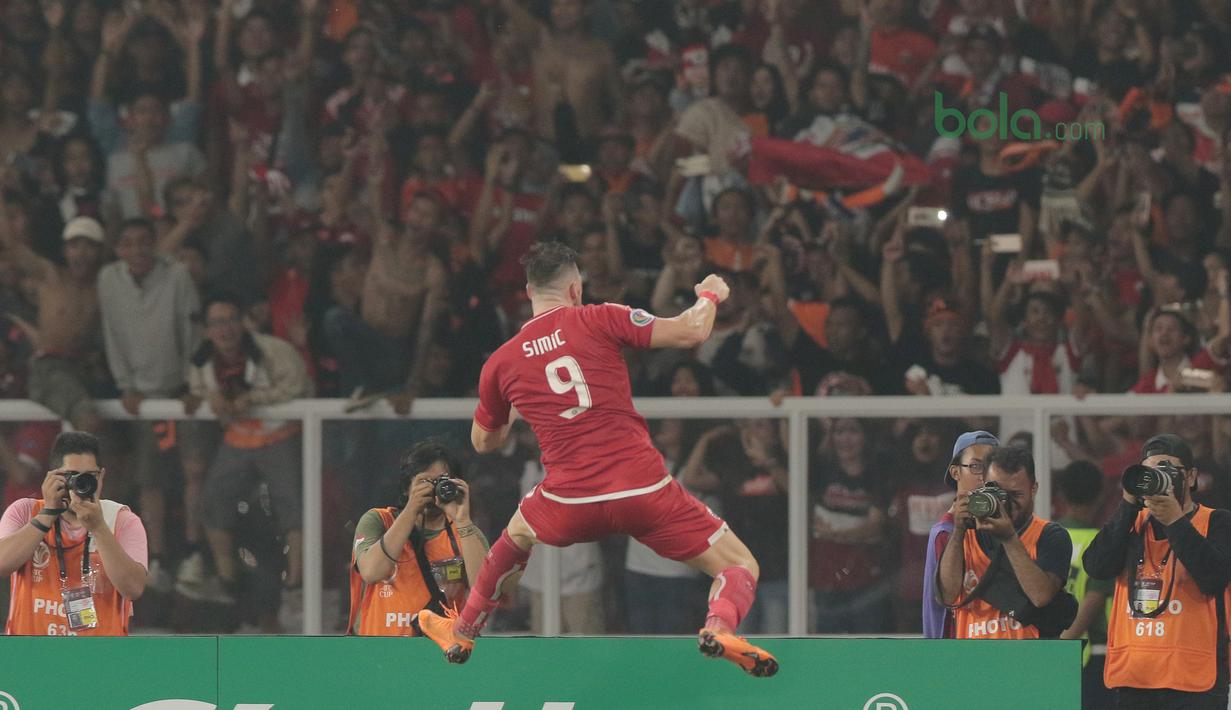 Ekspresi Pemain Persija Jakarta, Marko Simic usai membobol gawang Johor Darul Ta’zim pada laga Piala AFC 2018 di Stadion Utama Gelora Bung Karno, Jakarta, Selasa (10/4/2018). Persija Jakarta menang 4-0.  (Bola.com/Nick Hanoatubun)