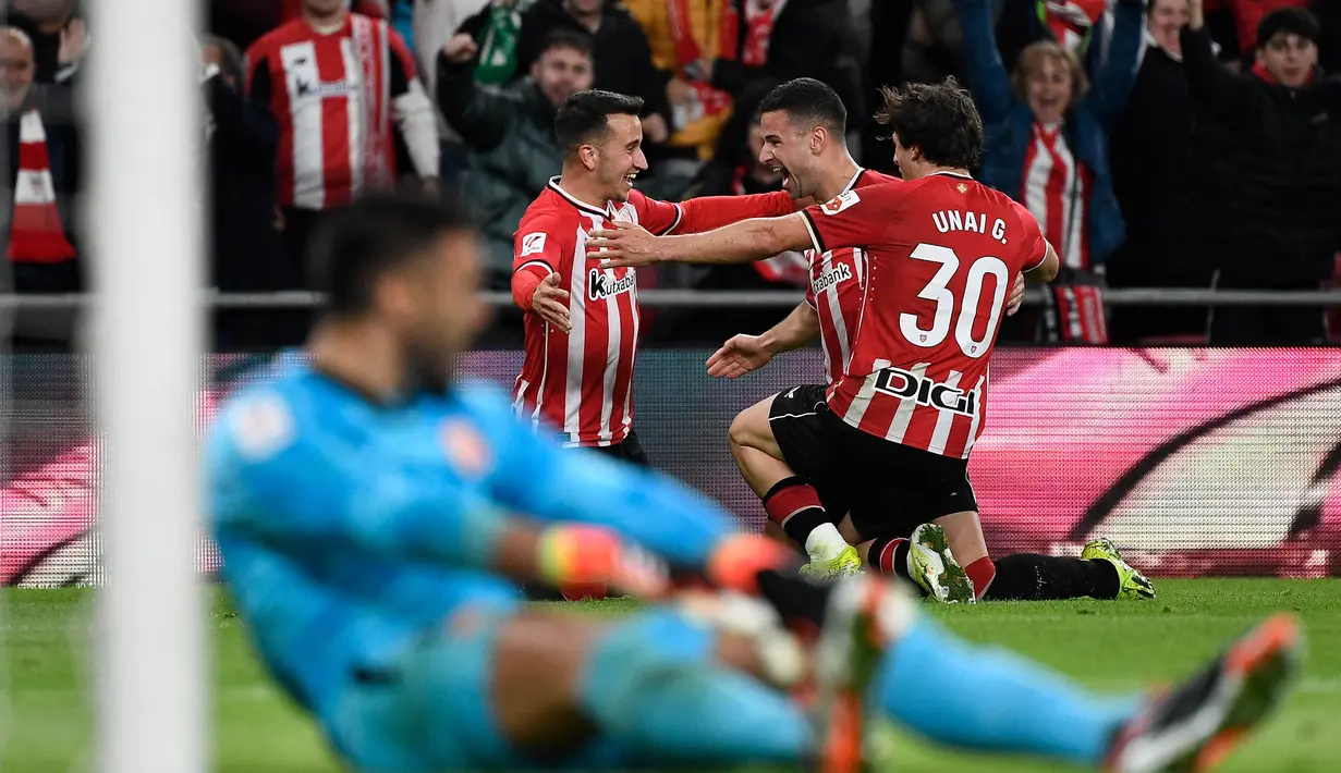 Dua gol Alex Berenguer (pada menit kedua dan 56) bersarang di gawang Girona. Serta satu gol tambahan yang dicetak Inaki Williams pada menit ke-75. (ANDER GILLENEA/AFP)