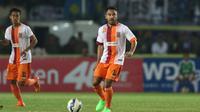 Pemain Pusamania Borneo FC, Ponaryo Astaman, saat bertanding melawan Persib dalam leg kedua perempatfinal Piala Presiden 2015 di Stadion Si Jalak Harupat, Bandung, Sabtu (26/9/2015). (Bola.com/Arief Bagus)