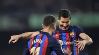 Robert Lewandowski merayakan gol pertama Barcelona saat melawan Cadiz pada lanjutan Liga Spanyol di Camp Nou (AFP)