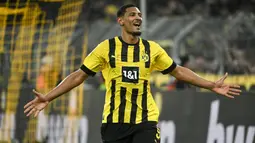 Selebrasi striker Borussia Dortmund, Sebastien Haller setelah mencetak gol ke gawang FC Cologne pada laga Liga Jerman 2022/2023 di Dortmund (18/3/2023). Sebastien Haller menjadi pemain termahal yang dijual Ajax ke Bundesliga di Liga Jerman. Pemain asal Prancis ini didatangkan Borussia Dortmund dari Ajax pada awal musim 2022/2023 dengan nilai transfer 31 juta euro atau setara Rp508 miliar. (AFP/Ina Fassbender)