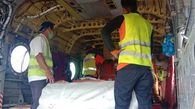 Helikopter milik BNPB yang bantu penanganan Covid-19 dan bencana di Sumbar. (Liputan6.com/ Novia Harlina)