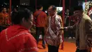 Menteri Perhubungan Budi Karya Sumadi menghadiri acara Tasyakuran HUT ke-46 PDIP di Tugu Proklamasi, Jakarta, Sabtu (20/7/2019). Dalam tasyakuran sekaligus perayaan kemenangan Jokowi-Maruf Amin itu, digelar pertunjukkan wayang kulit dengan mengambil lakon "Aji Norontoko" . (Liputan6.com/Herman Zakha