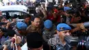 Gubernur nonaktif DKI Jakarta Basuki Tjahaja Purnama (Ahok) tiba di Bareskrim Mabes Polri, Jakarta, Selasa (22/11). Ahok ke Mabes Polri untuk menjalani pemeriksaan perdana sebagai tersangka kasus dugaan penistaan agama. (Liputan6.com/Johan Tallo)