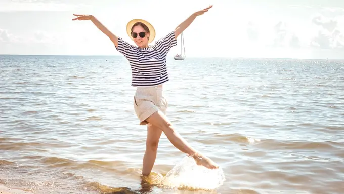 Ilustrasi berlibur ke pantai