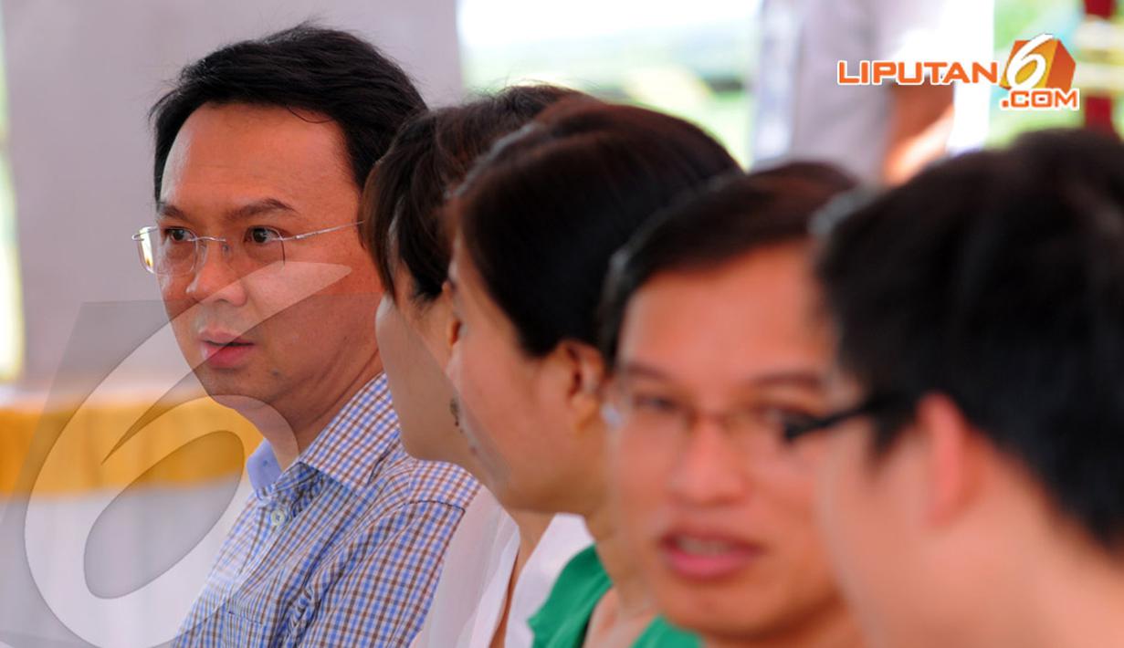 [FOTO] Ahok Ikut Nyoblos Bareng Istri - Foto Liputan6.com