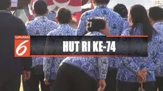 Tak hanya bercengkrama, sejumlah ASN juga asik bermain telepon genggam. Padahal, disaat bersamaan lagu Indonesia Raya sedang dikumandangkan.