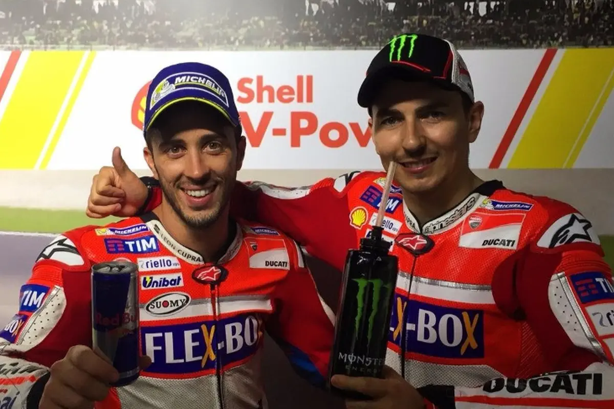 Andrea Dovizioso (kiri) dan Jorge Lorenzo