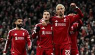 Hugo Ekitike dan Florian Wirtz merayakan gol saat Liverpool menang telak 6-0 atas Qarabag dalam lanjutan Liga Champions 2025/2026 di Stadion Anfield, Kamis (29/1/2026) dini hari WIB. (Paul ELLIS / AFP)