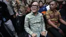 Sebelumnya, dalam penyidikan perkara ini, KPK mengidentifikasi dugaan pemerasan mencapai Rp 201 miliar. Tampak dalam foto, tersangka kasus dugaan pemerasan dalam pengurusan sertifikat K3 di Kementerian Ketenagakerjaan yang juga mantan Wakil Menteri Ketenagakerjaan (Wamenaker), Immanuel Ebenezer Gerungan (kiri) sesaat sebelum mengikuti persidangan di Pengadilan Tindak Pidana Korupsi (Tipikor) Jakarta pada Pengadilan Negeri Jakarta Pusat, Senin (19/1/2026). (Kapanlagi.com/Budy Santoso)