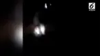 Terekam sosok putih diboncengi pengendara motor.