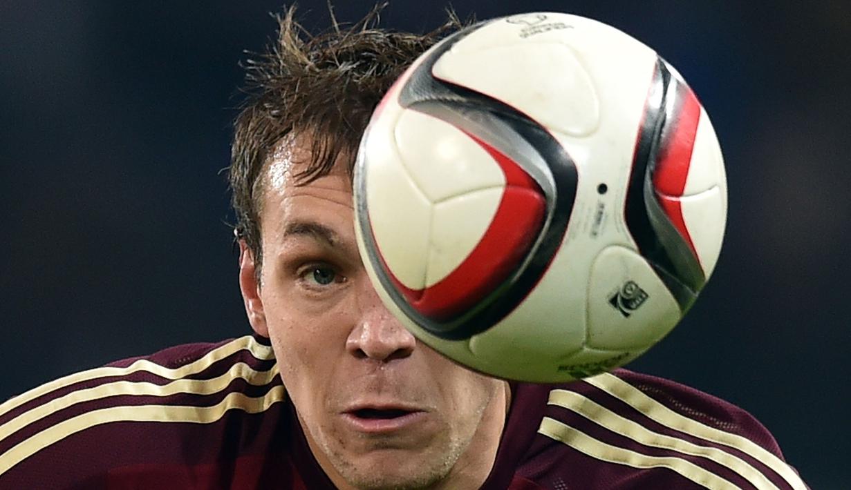 PERINGKAT III -  Penyerang Rusia, Artem Dzyuba berada pada peringkat ketiga deretan pencetak gol terbanyak pada kualifikasi Piala Eropa 2016 dengan delapan gol dari delapan pertandingan. (AFP Photo/Kirill Kudryavtsev)