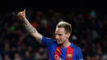  Gelandang Barcelona Ivan Rakitic melakukan selebrasi usai membobol gawang Celta Vigo dalam lanjutan Liga Spanyol pekan ke-26 di Stadion Camp Nou, Minggu (5/3). Barca tampil memukau dengan menciptakan 5 gol tanpa balas ke gawang Celta Vigo. (AP PHOTO)