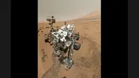 Mars Science Laboratory yang dijuluki "Rasa ingin tahu", adalah penjelajah besar dengan tujuan mengeksplorasi lingkungan Mars. (businessweek.com)