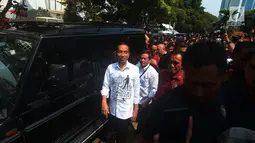 Presiden Joko Widodo usai mendaftarkan Capres-Cawapres ke Komisi Pemilihan Umum (KPU), Jakarta, Jumat (10/8).  Jokowi dan Ma'ruf Amin resmi sebagai capres-cawapres untuk Pilpres 2019. (Merdeka.com/Imam Buhori)