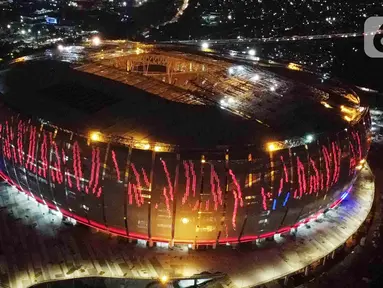 Foto udara Jakarta International Stadium (JIS), Jakarta, Selasa (15/3/2022). Berdasarkan laporan mingguan ke-132, PT Jakarta Propertindo mencatat progres realisasi pembangunan stadion yang diproyeksikan berkapasitas 82.000 penonton itu mencapai 98,60 persen. (Liputan6.com/Herman Zakharia)