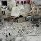 Pandangan dari udara menunjukkan bangunan yang hancur setelah serangan udara rezim di Kota Ariha, Idlib, Suriah, Rabu (15/1/2020). Serangan udara tersebut dilakukan di tengah gencatan senjata yang sedang berlangsung di Idlib. (Omar HAJ KADOUR/AFP)