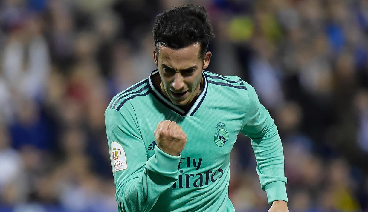 Penyerang Real Madrid, Lucas Vazquez berselebrasi usai mencetak gol ke gawang Real Zaragoza pada pertandingan Copa del Rey (Piala Raja) di stadion La Romareda di Zaragoza (29/1/2020). Real Madrid melaju mantap ke perempatfinal Copa del Rey setelah mengalahkan Zaragoza 4-0. (AFP Photo/Jose Jordan)