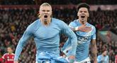 Pemain Manchester City, Erling Haaland, melakukan selebrasi setelah mencetak gol ke gawang Liverpool pada laga Liga Inggris di Stadion Anfield, Senin (9/2/2026) dini hari WIB. (AP Photo/Jon Super)