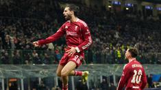 Pemain Liverpool, Dominik Szoboszlai, melakukan selebrasi setelah mencetak gol ke gawang Inter Milan pada matchday 6 fase grup Liga Champions 2025/2026 di Stadion Giuseppe Meazza, Rabu (10/12/2025) dini hari WIB. (AP Photo/Luca Bruno)