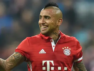 Bayern Munchen menang 2-0 atas Borussia Monchengladbach dalam laga pekan ke-8 Bundesliga 2016-2017, Sabtu (23/10/2016). Gol kemenangan dicetak Arturo Vidal dan Douglas Costa. (AFP/Christof Stache)