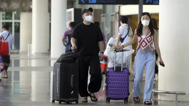 Bali menyambut kembali penerbangan pertama dari China