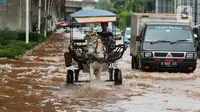 Sebelumnya, hujan deras yang mengguyur Jakarta sejak Selasa (28/1) hingga Rabu (29/1/2025) menyebabkan genangan air di sejumlah wilayah. (Liputan6.com/Herman Zakharia)