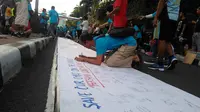 Kampanye Selamatkan Anak dari Dampak Buruk Internet di Jalan Sudirman, Jakarta Pusat, Minggu (2/10/2016). (Liputan6.com/Muslim AR)