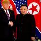 Jabatan tangan Presiden Amerika Serikat Donald Trump dan Pemimpin Korea Utara Kim Jong-un di Metropole Hotel, Hanoi, Vietnam (AP)