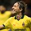 Pemain AC Milan, Luka Modric, merayakan gol yang dicetaknya ke gawang Bologna pada pekan 3 Liga Italia Serie A di Stadion San Siro, Senin (15/9/2025) dini hari WIB. (Stefano RELLANDINI / AFP)