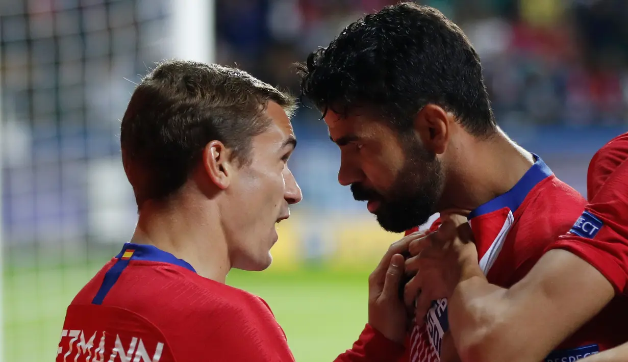 Penyerang Atletico Madrid, Diego Costa berselebrasi usai mencetak gol ke gawang Atletico Madrid pada final Piala Super Eropa di Lillekula Stadium di Tallinn, Estonia, (15/8). Real Madrid kalah 4-2 atas Atletico. (AP Photo/Pavel Golovkin)