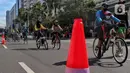 Warga bersepeda saat Car Free Day di Kawasan Bundaran HI, Jakarta, Minggu (4/9/2022). Pemerintah Provinsi DKI Jakarta akan memiliki jalur sepeda hingga 309,5 kilometer. (Liputan6.com/Angga Yuniar)
